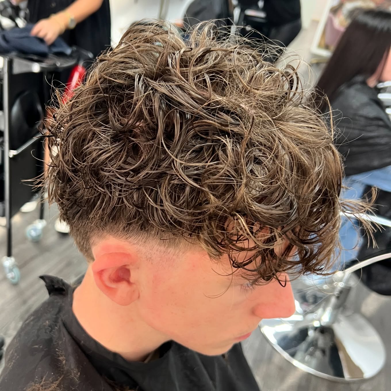 Men’s perm with a taper by Rosewood in Woonona