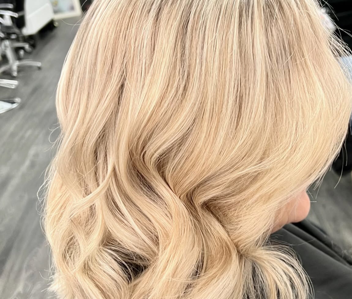 Blonde blow wave finished in the salon at Rosewood in Woonona
